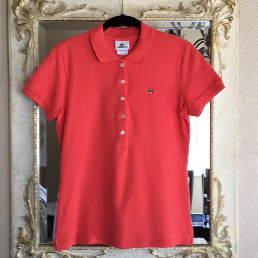 Lacoste polo. 5-button. Salmon orange.42 (US L/10)